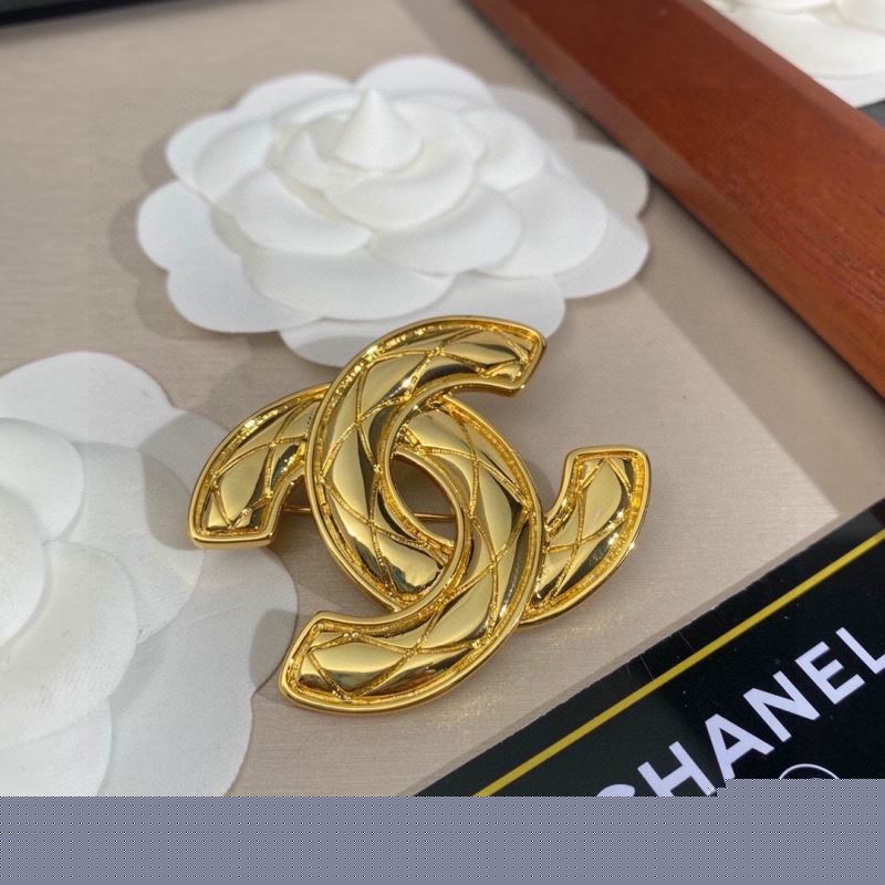 Ch*el brooches